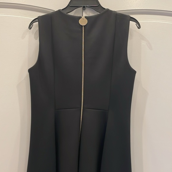 Calvin Klein black tie dress size 10 so cute with pockets.Sleeveless. Worn once - Picture 4 of 5